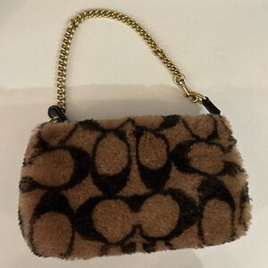 Coach x Jennifer Lopez Nolita 19 in Signature Shearling